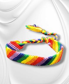 "Pride Friendship Bracelet": Let your true colors shine with this Pride Friendship Bracelet! Crafted with a rainbow of cheer, this bracelet comes with a sliding knot closure for easy on and off. Show your support for the community and wear it with pride! Bracelet has a sliding knot adjustable closure. . Pride Friendship Bracelet, Sliding Knot Closure, Pride Bracelet, Sliding Knot, A Rainbow, Friendship Bracelet, The Community, True Colors, Friendship Bracelets