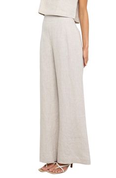 A streamlined fit through the hips gives way to a trend-savvy wide-leg silhouette in these high-waist linen pants perfect for warm weather. Hidden back-zip closure Back patch pockets Unlined 100% linen Hand wash, line dry Imported Affordable Cotton Pants With Adjustable Waist, Versatile Linen Bottoms For Spring, Versatile Beige Linen Bottoms, Versatile Solid Color Linen Bottoms, Neutral Linen Straight Pants, Versatile Beige Linen Pants, Chic Linen Straight Pants, Chic Flax Colored Linen Bottoms, Spring Linen Wide-leg Bottoms