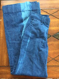 "The coolest vintage wide leg denim jeans! Trouser style fit, high on the waist. Big streaks down front and back with faded dye. Large belt loops. Large hip pockets, no pockets on butt. Made by Vicerer. Condition is like new. Sizing is modern 6/8, see measurements below: 28\" waist 36\" hips 32.5\" inseam 12\" leg opening laid flat" Pre-washed Indigo Denim Bottoms, Indigo Pre-washed Straight Leg Bottoms, Faded Relaxed Fit Wide Leg Flare Jeans, Faded Wide Leg Flare Jeans With Relaxed Fit, Faded Wide Leg Relaxed Fit Flare Jeans, Indigo Wide Leg Flare Jeans With Five Pockets, Dark Wash Full Length Flare Jeans In Recycled Denim, Faded Wide Leg Cotton Flare Jeans, Faded Relaxed Fit Full Length Flare Jeans