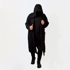 Very cool and comfortable unisex long hooded oversized coat with full zipper. Nice dense french terry fabric makes it cozy. It goes well with streetwear, gothic, punk, cyberpunk, militari, ninja, post-apocalyptic, jedi or sith styles, as easily as it fits in everyday wear. IMPORTANT! We can make a warmer version of the fabric with a fleece inside. If you want one, write to us. * 70% Cotton/ 30% Polyester. * Oversize. * Air-jet spun yarn with a soft feel and reduced pilling. * Strong overlock sea Oversized Black Sweater Coat For Loungewear, Oversized Hooded Jacket With Adjustable Hood For Loungewear, Oversized Cotton Techwear Outerwear, Oversized Hooded Parka For Streetwear, Oversized Parka With Drawstring Hood For Streetwear, Oversized Cotton Parka Long Coat, Urban Oversized Cotton Parka, Oversized Urban Cotton Parka, Oversized Cotton Parka For Streetwear