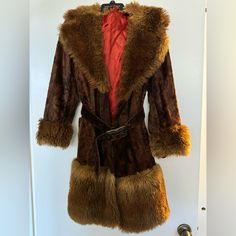 Astraka Faux Fur Coats Were Made In England And Of Amazing Quality And Style. This Jacket Is In Fabulous Vintage Condition With No Size Tags, Likely An 8/10 In Contemporary Sizes (Happy To Provide Exact Sizing To Interested Buyer). Likely Late 60s/Early 70s. No Rips Or Tears To Lining And No Staining Or Damage To Fur. Unique Piece That I’ve Had Since Late 80s! Brand Tag Missing A Stitch To Hold In Place Properly. Vintage Faux Fur Long Sleeve Outerwear, Vintage Long Sleeve Faux Fur Outerwear, Vintage Faux Fur Outerwear With Long Sleeves, Retro Long Sleeve Winter Fur Coat, Retro Long Sleeve Fur Coat For Winter, Vintage Fall Costume Outerwear, Retro Fur Coat With Faux Fur Lining For Fall, Retro Fall Fur Coat With Faux Fur Lining, Retro Faux Fur Lined Coat For Fall