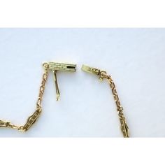 This is part of Chairish’s Fine Jewelry assortment.  A beautiful, elegant, detailed, strong, and well-made choker necklace in 14-karat yellow gold, circa mid to late-20th century. Necklace has beautiful, detailed chain links and detailed bar clasp. A chic vintage piece to wear alone or stack with other necklaces, dress up or down. Very good condition as shown in images. No issues. Marked '14k' on clasp. A true choker necklace measuring: 13.88" long.  Emerald stud earrings (in ear) are also avail Formal Yellow Gold Chain Necklace With Gold Clasp, Elegant Brass Jewelry With Figaro Chain, Elegant Brass Necklace With Figaro Chain, Elegant Formal Chain Necklace With Lobster Clasp, Elegant Necklaces With Oval Link And Gold Clasp, Elegant 14k Gold Chain Necklace With Lobster Clasp, Victorian Gold Chain Necklace For Formal Occasions, Victorian Gold Chain Necklace For Formal Events, Gold Chain Necklace With Gold Clasp For Formal Occasions