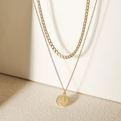 Sku: NSSN696STGC Details: The golden coin layered necklace is full of many simple details, and we simply cannot get enough details. This gold layered necklace has two lines-one with the most perfect pendant, and the other with a little design, adding some extra things. The layered coin necklace creates a beautiful layered look in just one step. Stainless Steel 316L features: With its resistance to rust and oxidation, this corrosion-resistant alloy is ideal for long-lasting jewelry designs. This Layered Gold Necklaces, Layered Coin Necklace, Gold Layered Necklace, Golden Coin, Stacked Necklaces, Multi Layer Necklace, Ring Stack, Little Designs, Gold Necklace Layered