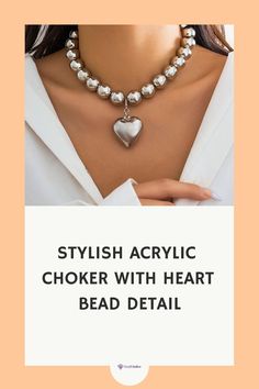 Dive into style 🌸 with our Acrylic Choker, featuring chic Heart Bead Detail. Ideal for fashion-forward individuals. This necklace adds a playful yet elegant touch to any outfit. Visit OutfitGalore.com to shop now! 🛍️ Trendy Heart Choker Necklace For Valentine's Day, Trendy Metal Heart Beads Necklace, Trendy Metal Heart Necklace With Heart Beads, Party Beaded Necklaces With Heart Beads, Party Heart Pendant Beaded Necklace, Party Beaded Necklace With Heart Pendant, Heart Beaded Necklaces For Parties, Heart-shaped Beaded Necklace For Parties, Beaded Heart Necklace For Parties