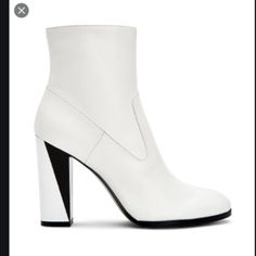 These Stylish White Boots Were Worn Once To An Indoor Event. Main Photo Is Stock But The Other Photos Are Of The Actual Boots. Notice The Bottoms Look Brand New. - Excellent Condition. - Heel Height - 4" - Size 9m White High Ankle Boots With Sculpted Heel, Modern White Heeled Boots With Sculpted Heel, Modern White Pointed Toe Boots, White Heeled Boots With Padded Heel, Medium Width, White Heeled Boots With Sculpted Heel And Medium Width, White Heeled Boots With Sculpted Heel And Pointed Toe, White Pointed Toe Heeled Boots With Sculpted Heel, White Heeled Boots With Padded Heel, White Pointed Toe Boots With Sculpted Heel