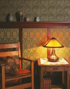 a book cover with an image of a table and chair in front of a lamp