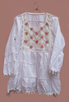 Handmade- Yes Neck - Round-Neck Sleeve Style - Long Sleeve Fit - Regular Fabric - Cotton Blend Type - Short Kurti Belt Included - Yes Pattern - Solid Color - White Pack of - 1 Fabric Care - Dry Clean Only Size - M (US 8-10, UK 12-14) bust: 91-96 cm / 36"-38" waist: 72-77 cm / 28.5"-30.5" hips: 98-103 cm / 38.5"-40.5" Size - L (US 12-14, UK 16-18) bust: 97-103 cm / 38.5"-40.5" waist: 78-84 cm / 31"-33" hips: 104-110 cm / 41"-43" Note - To Go Direct Our Home page Please Click Below- https://www.et Fitted Bohemian Blouse With Embroidered Neckline, Summer Festive Kurta With Embroidered Border, Bohemian Dresses With Woven Motifs For Eid, Bohemian Tops With Woven Motifs For Festive Occasions, Bohemian Tunic With Chikankari Embroidery For Summer, Bohemian Blouse With Woven Motifs For Festivals, Festive Bohemian Tops With Woven Motifs, Bohemian Free Size Kurta For Festivals, Bohemian Dresses With Resham Embroidery For Festive Occasions