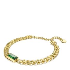 Introducing the You're A Gem Bracelet, a stunning addition to your jewelry collection. Featuring a unique double link bracelet design, this piece exudes sophistication and style. At its center sits a large green stone, adding a pop of color and elegance to any ensemble. Crafted from high-quality 18K gold plated stainless steel, this bracelet is not only durable but also resistant to water and tarnishing, ensuring long-lasting wear. Its hypoallergenic properties make it suitable for even the most Modern Double Chain Bracelet, Green Link Chain Jewelry, Elegant Adjustable Green Gold Bracelet, Green Chain Bracelet Jewelry, Elegant Green Metal Charm Bracelet, Modern Green Gemstone Bracelets, Formal Green Jubilee Chain Bracelet, Green Chain Bracelet For May Birthstone, Green Formal Jewelry Chain