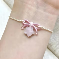 Pink Stone Bowknot Star Bracelet Add an elegant touch to any outfit with our adorable Pink Stone Bowknot Star Bracelet! Made with delicate pink stones and a charming bowknot and star design, this bracelet is perfect for adding a touch of cuteness to your ensemble. A must-have for all fashion lovers! Kawaii Bracelet, Hand Jewelry Rings, Braided Bracelet Diy, Pink Stones, Gold Girl, Chalcedony Stone, Wrist Jewelry, Magical Jewelry, Girly Accessories