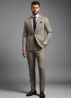 Experience the refined charm and pleasure of dressing in our exquisite Italian Light Brown Herringbone Flannel Suit, tailored to be as exceptional as you are. Made from premium-grade wool, this suit boasts a light brown shade that exudes warmth and approachability, while its herringbone design elevates you to the epitome of elegance with a subtle touch of contemporary flair. Whether you're attending a formal event, a business meeting, or a special celebration, this suit is your ultimate go-to choice for a distinguished and polished look.  Look features a 2 button jacket with notch lapels,  horn brown  buttons, single vent, three cuff buttons and two welted back pockets on trousers. 
  Click 'Customize Now' to modify the look if needed.     
  
Lining: Viscose. Blue Tweed Jacket, Grey Tweed Suit, Tweed Shirt, Peaky Blinders Suit, Flannel Suit, Herringbone Design, Brown Shade, Herringbone Tweed, Green Suit