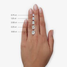 a woman's hand with three different sized diamonds on her finger and measurements for each diamond