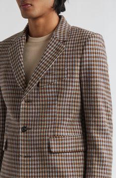 The silhouette of this dapper blazer is a reproduction of a midcentury jacket and is made from herringbone-woven merino-wool tweed to enhance the retro vibe. Three-button closure Notched lapels Four-button cuffs Chest welt pocket; front flap pockets Back vents 100% merino wool Dry clean Made in France Designer Clothing Herringbone Suit, Tweed Suit, Check Suit, Tweed Suits, Checked Blazer, Sports Blazer, Wool Suit, Double Breasted Blazer, Retro Vibe