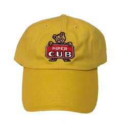 PRICES MAY VARY. 100% Cotton Hand Wash Only Vintage Piper Cub Logo Hat Brushed cotton twill cap with embroidered logo. Adjustable strap. Looks great to wear anywhere. Spring Cotton Hat With Logo Patch, Retro Cotton Dad Hat For Streetwear, Retro Cotton Dad Hat With Curved Bill, Retro Cotton Dad Hat With Embroidered Logo, Yellow Cotton Trucker Hat, Trendy Cotton Baseball Cap With Logo Patch, Retro Cotton Dad Hat With Flat Bill, Retro Cotton Baseball Cap With Curved Brim, Retro Cotton Trucker Hat With Curved Brim