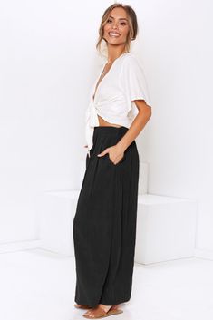 Black Buttoned Maxi Skirt Casual High Waist Black Maxi Skirt, Black Lined Relaxed Skirt Bottoms, High-waisted Maxi Skirt For Day Out, High Waist Maxi Skirt For Day Out, Relaxed Skirt Bottoms For Day Out, Black Skirt With Pockets For Day Out, Summer Black Maxi Skirt With Pockets, Wide Leg Lined Skirt For Vacation, Flowy Black Maxi Skirt With Pockets