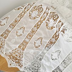 "This fabric is a graceful , first quality pure cotton lace fabric, fully embroidered and crocheted, which has a very high demand for machines . * Crochet Floral embroidered lace fabric: ivory in color  . two borders embroidered on symmetrical little flower. * Width 51 inch (130cm), listed for 35'X51\" (90cm x 130cm). that is a full yard , more buying it will be cut as one piece . Gorgeous lace fabric ,perfect for wedding dress, bridal gown , curtain, party apparel etc. * Wholesale accetpable ! White Cotton Lace Dress With Lace Work, White Dresses With Delicate Cotton Lace, White Cotton Lace Dress With Delicate Details, White Cotton Lace With Lace Patchwork, White Cotton Lace With Patchwork, Bohemian White Cotton Lace, White Cotton Lace In Bohemian Style, White Crochet Lace Cotton Lace, White Crochet Lace Cotton