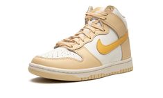 The Women’s Nike Dunk High “Pale Vanilla” is a women’s-exclusive colorway of the popular retro basketball and lifestyle shoe with a spring and summer vibe.  The “Pale Vanilla” features a white leather base with Pale Vanilla leather overlay panels.  A Topaz Gold leather Swoosh can be found on both sides of the shoe.  The orange-gold hue also appears on the “Nike” and Swoosh branding on the tongue tag.  Underfoot, a white midsole and Pale Vanilla rubber outsole put the finishing touches on this Du Dunks High, Sneaker Displays, Sneakers Box, Kobe Shoes, Retro Basketball, Nike Gold, Sneaker Release, Nike Dunk High, Dunk High