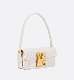 New for Winter 2024, the Miss Dior flap bag redefines House staples of modern elegance. The latte quilted calfskin showcases the collection's hallmark Miss Dior Allover motif, inspired by the Marc Bohan for Dior archives in a modern take on the 1960s. It has a timeless aesthetic contrasted by a modern plate in antique gold-finish metal with the Miss Dior signature, while the flap reveals a main compartment completed by a zip pocket to accommodate all the essentials. Thanks to the adjustable stra Star Shoes, Wallet Pouch, Backpack Tote Bag, Miss Dior