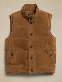 The decadence of suede meets the versatility of quilted construction in a vest designed for cold-weather luxury.  Warm and layerable, this quilted puffer vest employs supple suede insulated with gloriously soft goose down to stave off the coldest tem Quilted Down Sleeveless Outerwear, Quilted Puffer Vest, Vest Designs, Puffer Vest, Vest Dress, Stand Collar, Cold Weather, Varsity Jacket, Banana Republic