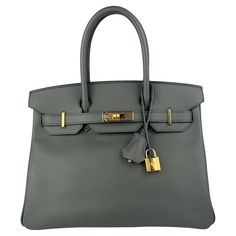 Ultra Rare Absolutely Stunning Hermes Birkin 30 Vert Amande Epsom Leather, Complimented by Gold Hardware. Pristine Condition with plastic on all Hardware. Excellent corners and structure. Z Stamp 2021. Please keep in mind that this is a pre owned item, the bag has been carried before, unless otherwise stated. The handbag may be in pristine condition but is not flawless. Please carefully review the detailed photos on the listing. Shop with Confidence from Lux Addicts. Authenticity Guaranteed! Birkin 30, Les Angles, Hermes Birkin 30, The Other Half, Bag Collection, Other Half, Hermes Bag, Handle Bag, Hermes Birkin