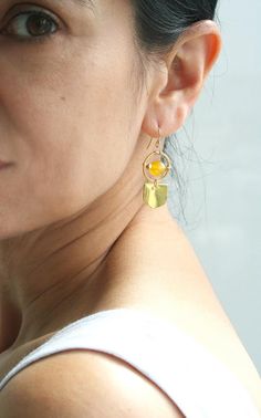 ★★★Golden yellow orbs of agate glow within these earrings. Need an earring that works well with work outfits and brunch dates, this piece is for you. + Yellow Agate. 14K Gold Fill Ear Wire. 14K Gold Plate Findings.+ Length: 1.5 inches.+ Earring take 1 day to make.+ Your jewelry will come in a jewelry box, tied with a ribbon.➤➤ Have a question about this product, reach out to me here ➙ https://www.etsy.com/conversations/new?with_id=9057464&referring_id=5772224&referring_type=shop&recipient_id=905 Modern Yellow Nickel-free Jewelry, Yellow Teardrop Earrings For Everyday, Yellow Teardrop Everyday Earrings, Yellow Bohemian Metal Earrings, Yellow Metal Drop Earrings, Handmade Yellow Metal Earrings, Handmade Round Citrine Earrings, Modern Yellow Dangle Earrings, Adjustable Fusion Style Drop Earrings