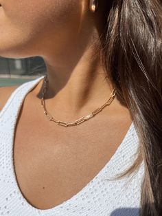 This classic chunky chain is a modern basic for every woman. We are in love with the 14K Gold Fill rectangular 'paperclip' links that can be worn on its own, layered with other necklaces, or holding your favorite charms and pendants. Includes a 2" adjustable chain for easy layering. Everyday 14k Gold Filled Paperclip Chain Necklace, Trendy Paperclip Chain Jewelry, Elegant Paperclip Charm Necklaces For Everyday, Minimalist Chunky Chain Oval Link Jewelry, Minimalist Chunky Chain Jewelry With Oval Links, Elegant Everyday Charm Necklaces With Paperclip Chain, 14k Gold Link Charm Necklaces For Everyday, Everyday 14k Gold Link Charm Necklaces, Everyday Paperclip Chain Link Charm Necklace