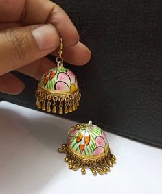 Beautiful Handmade Jhumkas Earrings. Hand Painted Jhumkas Earrings. Light Weight Earrings. Bollywood Jhumkas Earrings. Metal - Brass,Copper. Multicoloured Jhumkas Earrings. White Fusion Danglers With Latkans, White Latkans Earrings For Navratri, White Meenakari Fusion Jhumkas, Multicolor Latkans Earrings For Puja, Multicolor Latkan Earrings For Puja, Bohemian White Jhumkas With Latkans, White Bohemian Jhumkas With Latkans, Handmade Multicolor Fusion Jhumkas, Multicolor Earrings For Navratri Puja