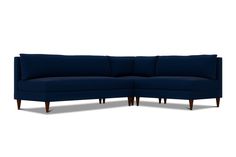 a blue sectional couch with wooden legs on an isolated white background