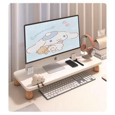 a desktop computer sitting on top of a white desk