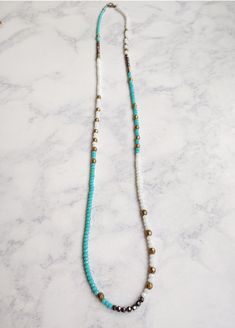 Bexley-Aqua-White-Hematite-Brass-Beaded-Layering-Necklace-Bracelet Adjustable Multi-strand Hand Wrapped Necklace, Adjustable Multi-strand Beaded Necklace For Everyday, Everyday Long Beaded Necklace, Turquoise Multi-strand Necklaces For Layering, Adjustable Beaded Chain Long Necklace For Beach, Spiritual Double Strand Beaded Necklaces For Layering, Adjustable Necklace For Layering, Bohemian Hand-strung Necklaces For Layering, Adjustable Beaded Long Necklace For Beach