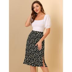 Through the summer seasons in this effortlessly chic flowy skirt. In a midi silhouette that wraps around, this skirt exudes the spring-summer feel you can't wait for. Sitting high on the waist, the light and breezy fabric trimmed with ruffles falls to a split skirt for impact and movement as you walk. Cut in a flared shape, this skirt is designed with a button closure at the side flattering for showing your looming legs. Adding a beautiful floral flourish for feminine appeal, this style is a fus Flowy Midi Length Skirt For Brunch, Summer Rayon Skirt For Brunch, White Midi Length Pencil Skirt For Summer, Summer Midi Length Rayon Skirt, Summer Midi-length Rayon Skirt, Flowy Midi Wrap Skirt For Brunch, Summer Midi Skirt In Rayon, Feminine Summer Lined Wrap Skirt, Flowy Midi Skirt For Brunch