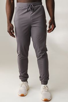 Our Navigator Jogger is designed to perform outdoors and on the go. This versatile jogger is a relaxed fit which offers functionality and comfort while also providing a sporty look to add to your wardrobe. Sporty Jogging Pants With Functional Drawstring, Solid Activewear With Functional Drawstring And 4-way Stretch, Gray Moisture-wicking Activewear With 4-way Stretch, Gray 4-way Stretch Moisture-wicking Activewear, Casual Breathable Activewear With 4-way Stretch, Gray Sporty Activewear With 4-way Stretch, Sporty Gray Activewear With 4-way Stretch, Sporty Gray 4-way Stretch Activewear, Gray 4-way Stretch Sporty Activewear