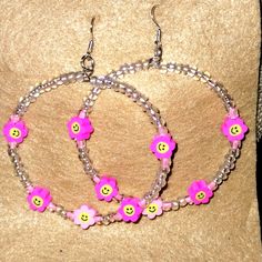 Cute Pink Smiley Face Handmade Beaded Hoop Earrings. 3 In Long 2 And 1/2 In Wide Glass Beads And Acrylic Beads Sterling Silver Plated Ear Wires Nickel Free Pink Smiley Face, Pink Smiley, Crystal Heart Earrings, Pineapple Earrings, Betsey Johnson Earrings, Daisy Studs, Ghost Earrings, Skull Earrings, Betsey Johnson Jewelry