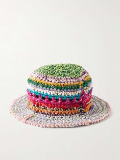 multicolored crocheted hat sitting on top of each other