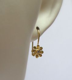 Flower Earrings - Beautiful 18K solid gold Earrings inlaid 3 Points diamonds. The Flower size - 6 mm. The Earrings are part of My Hidden Seeds Collection. The earring are handmade and one of a kind earrings. Free Shipping The earrings will be packed in a Beautiful gift box . Your earrings will be shipped via registered air mail with tracking number. Please contact me with any questions or requests. My Sterling Silver Hidden Seeds Collection at http://www.etsy.com/il-en/shop/NogaJewelry# Hand Set Yellow Gold-plated Earrings, Fine Jewelry Flower-shaped Earrings With Single Cut Diamonds, Fine Jewelry Flower-shaped Diamond Earrings, Hand Set Yellow Gold Earrings For Gift, Flower Shaped Diamond Earrings In Fine Jewelry Style, Elegant Hand-set 22k Gold Earrings, Hand Set 22k Yellow Gold Earrings, Elegant Hand Set 22k Gold Earrings, Exquisite Single Cut Diamond Earrings For Gift