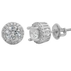 "Amazing stud earrings Nice basket setting Stones on all sides for a crazy flooded out look! Solid 925 sterling silver Wont turn your ears green! 1.8ct vvs man made diamonds...5mm center stone SUPER ICY...Must see in the sun! About 0.3\" (8mm) wide perfect small size! Pair weighs around 2.5 grams Screw backs for a secure fit!" Sterling Silver Round Halo Cluster Earrings, Sterling Silver Halo Round Earrings, Round Sterling Silver Halo Earrings, Sterling Silver Cluster Earrings With Halo, Silver Cubic Zirconia Round Plug Earrings, Sterling Silver Round Earrings With Halo Setting, Silver Halo Diamond Earrings In Sterling Silver, Silver Halo Cluster Earrings, Silver Round Halo Earrings