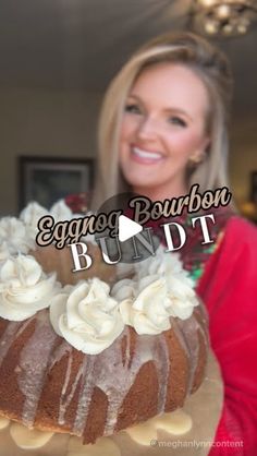 a woman holding a bundt cake with icing on it and the caption says eggnog bourbon bundt