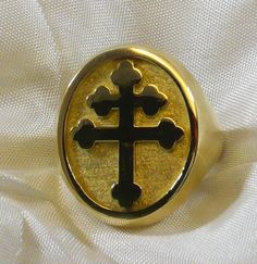 "Lorraine Cross ring in solid sterling silver. Yellow gold plated. Any Size Available Each ring is sized to your exact size in the wax stage before casting. The seal measures 27/32 \" x 45/64\" mm 21,5 x 17,70 Weights 15 grams Each ring is made to size Anello Croce di Lorena in argento 925 millesimi dorato" Symbolic Gold Plated Jewelry For Formal Occasions, Formal Symbolic Gold Plated Jewelry, Gold-tone 14k Gold Ring For Gift, Classic Gold-tone Rings, Gift Gold-tone 14k Gold Rings, Gold Rings With Shiny Finish For Gift, Yellow Gold Fine Jewelry Rings, Classic Gold Plated Engraved Ring, Gold Sterling Silver Ring With Shiny Finish