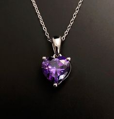 Solid Sterling Silver Amethyst February birthstone heart pendant. Great February birthday gift, valentines gift or 6th wedding Anniversary gift. Matching earrings available here: https://www.etsy.com/listing/1352794165/ Available to order in gold, white gold, rose gold or platinum, please contact me for prices. 💎Pendant thickness: 6mm 💎Pendant width: 9mm 💎Pendant overall Length: 17mm 💎Chain length: 18 inch or other length if required. ✨ For free giveaways, special offers and latest design up Heart-shaped Gemstone Necklace For Wedding, Heart-shaped Gemstone Heart Necklace For Weddings, Purple Heart Necklace For Valentine's Day Gift, Purple Double Heart Jewelry For Gifts, Gemstone Heart Pendant Necklace For Wedding, Purple Double Heart Jewelry Gift, Heart Shaped Gemstone Necklace For Wedding, Valentine's Day Gemstone Jewelry For Birthday Gift, Elegant Heart Necklace For Valentine's Day Birthday