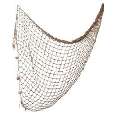 a large net hanging from the side of a wall with shells on it's sides