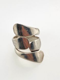 "Vintage Modernist Sterling Silver Double Wrap Ring -Unique abstract modern ring -Double wrap makes this ring elongated on the finger -Ring is size 6.75 -Ring is hallmarked \"Mexico 925\" -Face of ring measures about 1.3\" x .75\" with a depth of .05\" -Total weight 9.5g -In excellent vintage condition with moderate surface scratches to the silver, tends to show more in the photos than in real life. Ready to wear and enjoy!" Modern Ring, Ring Finger, Wrap Rings, Unique Rings, Rings Statement, Cuff Bracelets, Statement Rings, Jewelry Rings, Wedding Rings