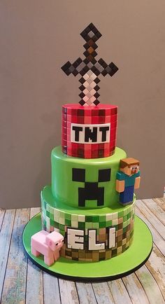 a cake made to look like a video game character on top of a green plate