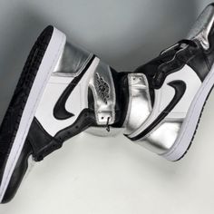 Metallic Black White Silver Jordan 1. Run Small In Size. If You Wear A 7 Or 7.5 You Can Fit. Silver Jordans, Sweet Sixteen Themes, Black And White Jordans, White Jordans, Silver Sneakers, Jordan 1s, Womens Jordans, Basketball Sneakers, How To Make Shoes