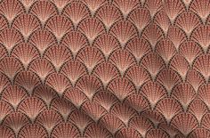 an image of a red and beige wallpaper with wavy lines on it's surface