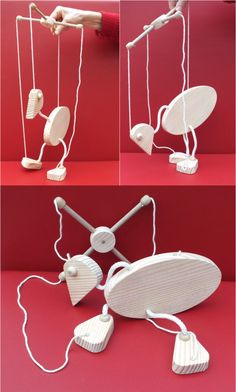 three different views of an object made out of wood and wire with wires attached to it