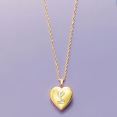 Ross-Simons - Plain - 14kt Yellow Gold Heart Locket Necklace. 20". Make her day with our luxe symbol of love! Crafted in polished 14kt yellow gold, our heart locket necklace is a timeless choice for so many occasions. Fits a 5/16" x 3/8" photo inside. Suspends from a rope chain. Springring clasp, 14kt yellow gold heart locket necklace. Heirloom Yellow Gold Locket Necklace With Heart Charm, Heirloom Yellow Gold Heart Charm Locket Necklace, Classic Heart Shaped 14k Gold Locket Necklace, Classic 14k Gold Heart Locket Necklace, Classic Yellow Gold Locket Necklace With Heart Charm, Yellow Gold Medallion Locket Necklace For Anniversary, Engraved Yellow Gold Locket Necklace For Anniversary, Personalized Yellow Gold Sterling Silver Locket Necklace, Personalized Sterling Silver Yellow Gold Locket Necklace