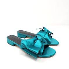 Size: 7m Color: Tropical Green Fancy Footwork. Our Calista Slides Are Pretty-Chic With A Bow On Top. Dark Romantic Vibes Come Across In Satin, Complemented By Just A Hint Of Heel For A Girlish Finish. Satin Upper Synthetic Linin Leather Sole 1" Heel Brand New, Never Worn. No Box. Evening Slip-on Flats For Spring, Chic Flat Mules For Party, Elegant Summer Beach Flats, Elegant Low Heel Summer Flats, Green Summer Evening Mules, Green Evening Mules For Summer, Green Flat Heel Party Sandals, Elegant Spring Beach Flats, Chic Green Formal Sandals