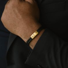 The Grady is a handmade bracelet featuring a slim cowhide leather strap. The design is comfortable, minimalist, straightforward, and stylishly refined.- WIDTH: 8 mm- MATERIAL TYPE: 100% genuine Cowhide leather- CLASP COLOR: Brushed gold- CLASP MATERIAL: 316L stainless steel, 18K gold-plated- CLASP TYPE: Magnetic Classic Leather Bracelets For Everyday, Minimalist Bracelets With Stainless Steel Clasp For Everyday Use, Adjustable Yellow Gold Leather Bracelet, Minimalist Bracelets For Everyday Use, Classic Gold Leather Bracelet For Everyday, Luxury Adjustable Leather Bracelet For Everyday Wear, Minimalist Leather Bracelet With Adjustable Stainless Steel Clasp, Modern Gold Leather Bracelet For Everyday, Gold Modern Leather Bracelet For Everyday Wear