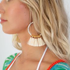 (1) Ivory Tassel Hoop Earrings | Bette Tassel Jewelry For Vacation, Bohemian Hoop Earrings For Beach In Spring, Handmade Hoop Earrings For Beach In Spring, Bohemian Tassel Earrings For Summer Vacation, Bohemian Tassel Earrings For Beach, Bohemian Dangle Hoop Earrings For Spring, Bohemian White Tassel Earrings For Pierced Ears, Trendy Hoop Earrings For Spring Beach Events, Chic Hoop Earrings For Summer Beach