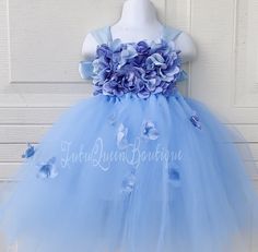 Our Beautiful full tutu dress is made out of high end soft tulle material . Sizes are according to 🇺🇸USA STANDARD SIZING. Tutu is tied comfortably in the back for a perfect fit ! Color Combo Choices : Are listed in Details but you can also custom color choice ! Message me your custom color 📭ALL tutus and dresses are shipped in a box with tracking. Arrives 2-5 days through USPS after scheduled delivery date. 📝Please read listing details. Thank you for visiting my page! For more photos and my Cute Blue Fairy Dress For Summer, Light Blue Tutu Dress For Summer Dress-up, Light Blue Princess Tutu Dress For Birthday, Light Blue Ruffled Tutu Dress For Baptism, Whimsical Summer Tutu Dress With Tulle Skirt, Blue Ruffled Tutu Dress For Spring, Light Blue Princess Sleeveless Tutu Dress, Blue Princess Dress With Tulle Skirt For Wedding, Light Blue Sleeveless Princess Tutu Dress