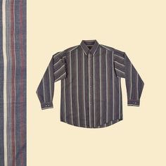 Vintage men's long sleeve striped shirt, manufactured circa 1990s by David Taylor. This button-down shirt features a grey/burgundy/beige striped pattern, lightweight fabric, and a collar. Size M.  - Time Period: c. 1990s  - Brand: David Taylor  - Size: M, long sleeve  - Colors: Burgundy, grey, beige, grey-ish blue & green  - Materials: 65% polyester, 35% cotton  - Made in: China  - Condition: In good, vintage condition w/ some minor pulled threads and some wear/loose threads in the armpits (see close-ups).  Measurements:   - Armpit to armpit: 22.5"  - Shoulder: 18"  - Length: 31"  - Sleeve: 24" Note: our measurements are taken with clothing laid flat. We do not double for circumference on horizontal measurements.  We offer free shipping within the United States for all orders over $35, and Classic Long Sleeve Yarn-dyed Shirt, Classic Yarn-dyed Long Sleeve Shirt, Fall Pinstripe Button-up Shirt, Yarn-dyed Long Sleeve Fall Shirt, Yarn-dyed Long Sleeve Shirt For Fall, Oversized Pinstripe Long Sleeve Shirt, Fall Button-up Shirt With Vertical Stripes, Fall Pinstripe Long Sleeve Tops, Relaxed Fit Yarn-dyed Button-up Shirt